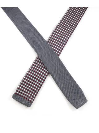 Вязаный галстук в разноцветную клетку и серой полоской на конце